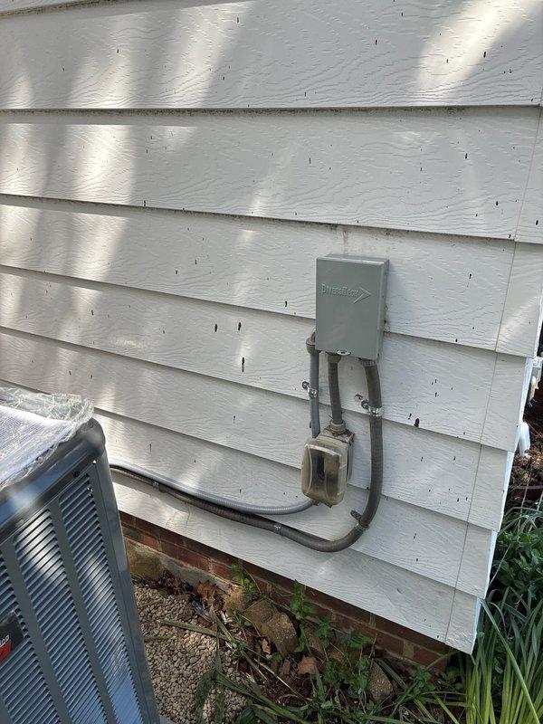 Completed full HVAC system installation including 96% efficiency furnace, air conditioning unit, and humidifier. Installed Amana outdoor condensing unit on concrete pad with proper electrical disconnect and conduit routing, established all refrigerant line connections, and verified system operation at manufacturer specifications.