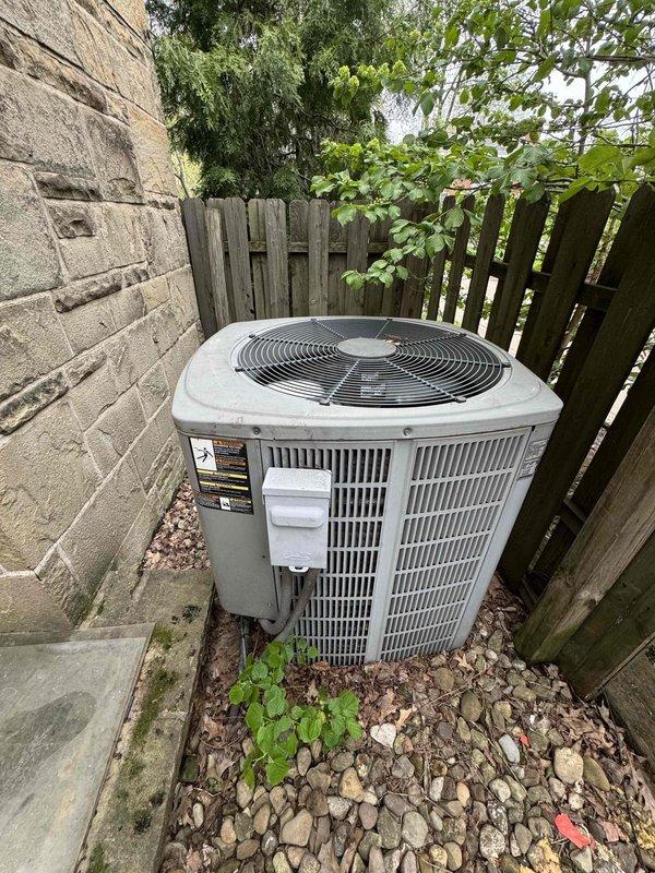 Responded to service call for air conditioning system failing to cool residence below 73 degrees. Upon arrival, performed diagnostic evaluation of outdoor condenser unit and electrical components. Utilized digital clamp meter to measure amperage and voltage at contactor, confirming proper electrical supply to unit. Inspected condenser for mechanical issues, refrigerant levels, and airflow restrictions. Unit found operational during testing with all electrical readings within manufacturer specifications.