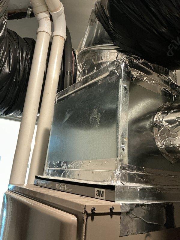 Completed comprehensive heating and cooling tune-up on Luxaire air handler system located in attic space. Performed standard maintenance protocol including filter inspection, verified proper operation of gas valve assembly and condensate drainage system, and confirmed all ductwork seals and connections were secure with no air leakage detected.