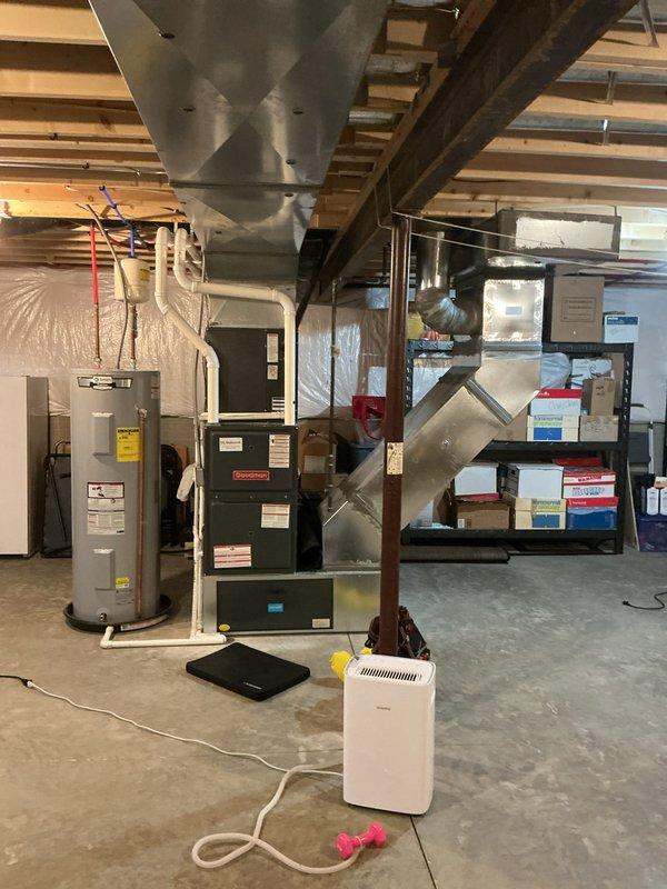 Responded to emergency no-heat call for Goodman furnace (Model GM5S920804CNAA, Serial 1705385102) tripping breaker upon startup with accompanying odor. Conducted diagnostic inspection of 80,000 BTU Category IV direct vent furnace system, documented equipment condition and identifying information, and assessed electrical system for short circuit or ground fault causing breaker trip. Provided customer with findings and repair quote to restore heating system operation.