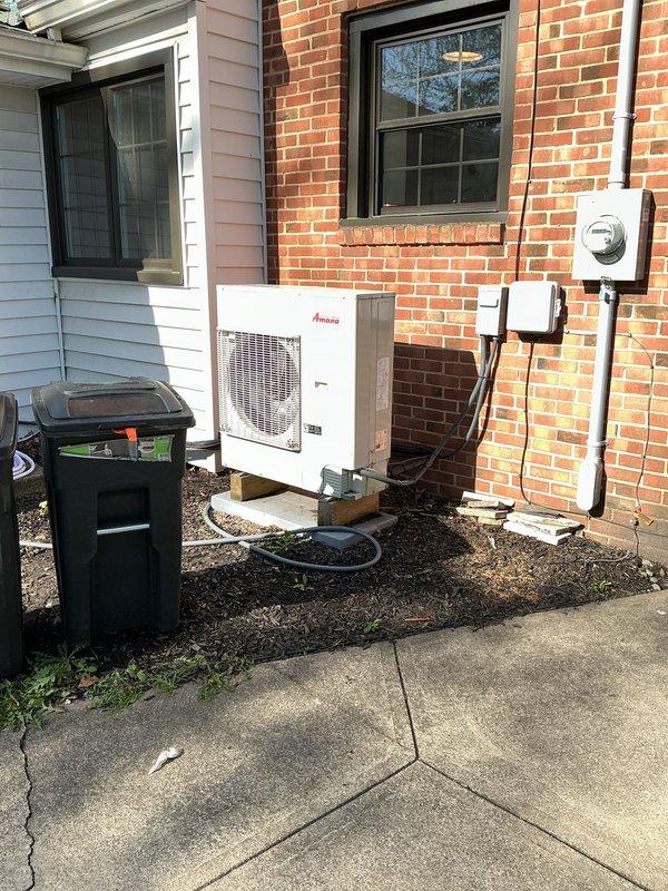 Completed first-year heating maintenance on Amana heat pump system as part of MVP preventive maintenance program. Performed comprehensive inspection of outdoor condenser unit and indoor air handler components, verified refrigerant lines and electrical connections, checked humidification system operation, and documented equipment condition through photographic records. All system components found operating within manufacturer specifications with no deficiencies noted.