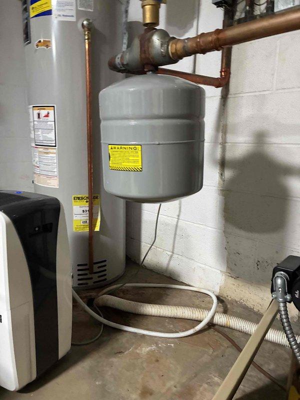 Performed comprehensive maintenance on residential hot water boiler system. Inspected heat exchanger tubes, expansion tank, and all associated piping connections to ensure proper operation and system integrity. Documented equipment condition with photographs for service records.