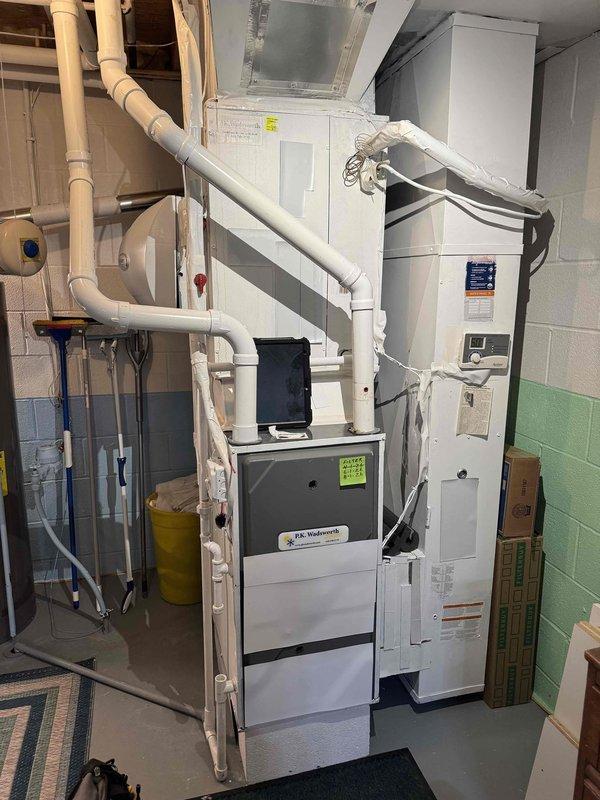 Completed routine cooling maintenance on residential HVAC system with outdoor condenser unit and indoor furnace. Performed standard seasonal inspection, cleaned condenser coils, checked refrigerant levels, tested system operation, and verified all components functioning properly in preparation for upcoming cooling season.