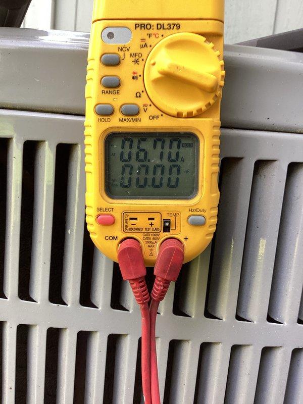 Completed cooling maintenance on two air conditioning systems. Performed electrical diagnostics using digital multimeter to verify voltage and amperage readings on both units. Systems tested and confirmed operational within normal parameters.