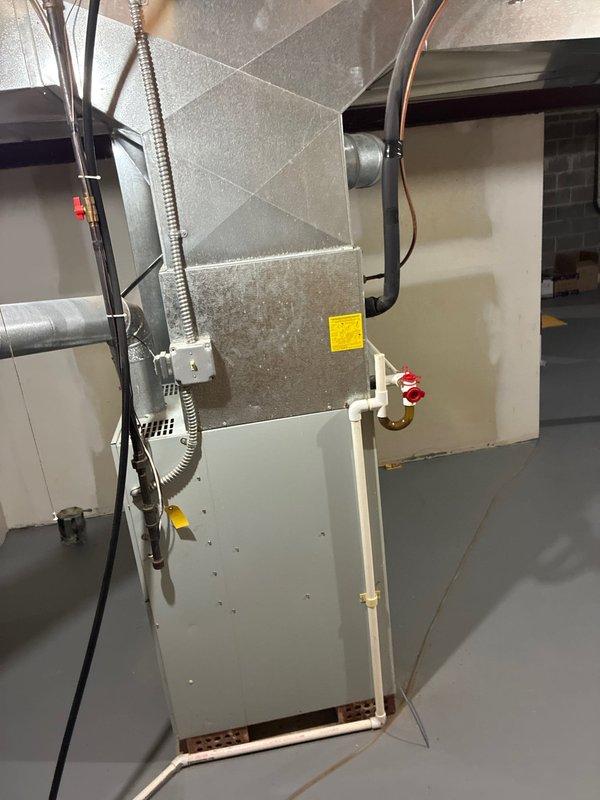 Conducted comprehensive evaluation of existing HVAC system in basement mechanical room to provide full system replacement options. Assessed current air handler unit, ductwork configuration, electrical connections, and refrigerant line routing. Documented equipment specifications, spatial constraints, and installation requirements through detailed measurements and floor plan sketches including furnace location, clearances, and existing infrastructure layout to develop accurate replacement proposals for complete system upgrade.
