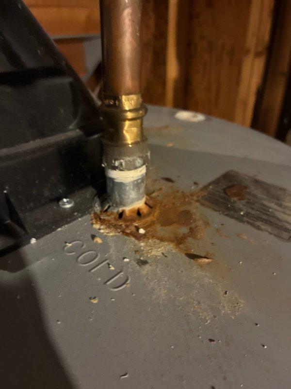 Conducted comprehensive assessment of existing flat roof HVAC system showing significant deterioration and corrosion at refrigerant line penetration points. Documented current equipment configuration and measured installation space requirements for complete system replacement, including furnace clearances and ductwork layout specifications.