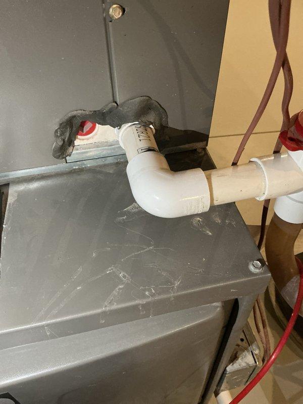 Performed routine preventative maintenance on residential cooling system. Inspected condensate drain line and connections, verified proper drainage flow. Measured and recorded compressor amperage at 23.3 amps using clamp meter, confirming unit operating within manufacturer specifications.