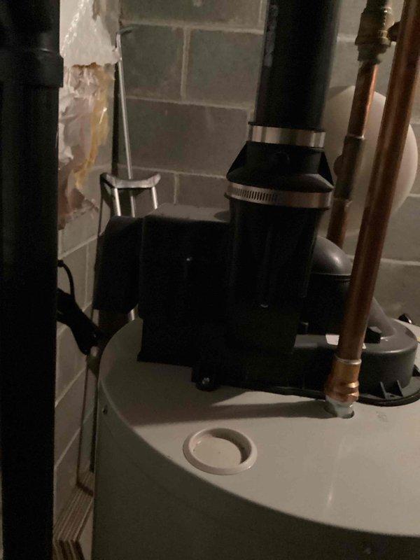 Performed routine maintenance on tanked water heater system, including complete flush to remove sediment buildup and ensure optimal performance. Inspected associated plumbing connections, condensate pump operation, and copper supply lines, confirming all components functioning properly with no leaks detected.