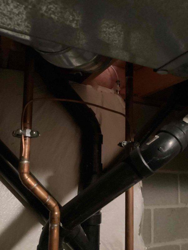 Performed routine maintenance on tanked water heater system, including complete flush to remove sediment buildup and ensure optimal performance. Inspected associated plumbing connections, condensate pump operation, and copper supply lines, confirming all components functioning properly with no leaks detected.