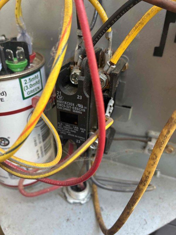 Completed routine cooling system maintenance on HVAC unit. Inspected and tested electrical components including contactor, dual-run capacitor (12.5/3.0 MFD), and control module with all connections found secure and operational. Verified proper wire terminations, tested capacitor values within specifications, and confirmed relay operation cycling correctly. System operating normally with all safety controls functioning as designed.