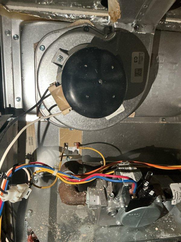 Completed comprehensive HVAC cooling and heating maintenance service on residential system. Inspected and documented air filter condition, noting dust accumulation on pleated media, and examined furnace interior components including blower motor assembly, gas valve with associated wiring connections, and all electrical systems to ensure proper operation for both heating and cooling seasons.