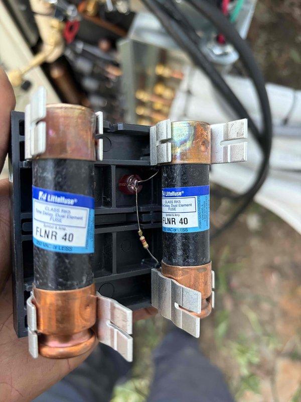 Completed installation of a 5-head mini split system over a three-day period. Installed indoor wall-mounted units, outdoor condensing unit, refrigerant line sets, electrical disconnects with 40-amp Littelfuse FLNR fuses, and control wiring. System tested and verified operational with all zones communicating properly.