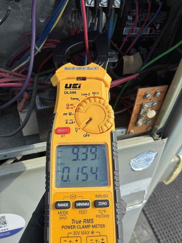Performed scheduled HVAC maintenance agreement inspection on commercial system. Conducted comprehensive diagnostics including temperature differential measurements using calibrated digital thermometer, recording system performance data. Verified electrical parameters at control panel using power clamp meter, measuring voltage and current draw to ensure proper operation within manufacturer specifications. All readings documented photographically for maintenance records.
