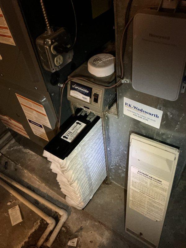 Performed comprehensive cooling system maintenance on residential Carrier HVAC unit. Inspected furnace assembly, ductwork connections, and associated components including Aprilaire humidifier control system. Verified proper operation of all mechanical systems, checked air filter condition, and confirmed gas valve assembly and electrical connections were secure. All equipment found operating within normal parameters with no issues identified.