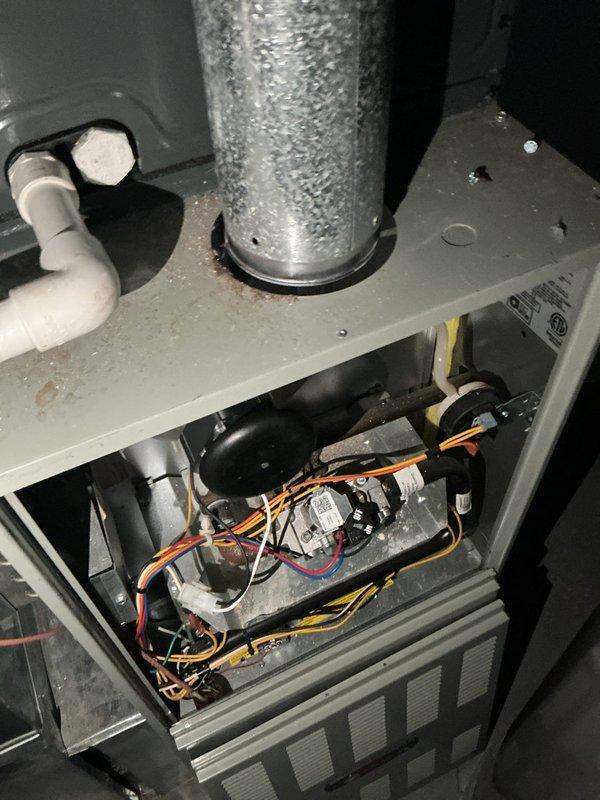 Returned to property to complete inducer motor replacement on HVAC system. Removed access panel, disconnected electrical connections and wiring harnesses from failed inducer assembly, and extracted old motor from unit housing. Installed new inducer motor, secured mounting hardware, reconnected all electrical components including control board wiring, and verified proper operation. System tested and confirmed inducer motor functioning correctly with appropriate draft pressure.