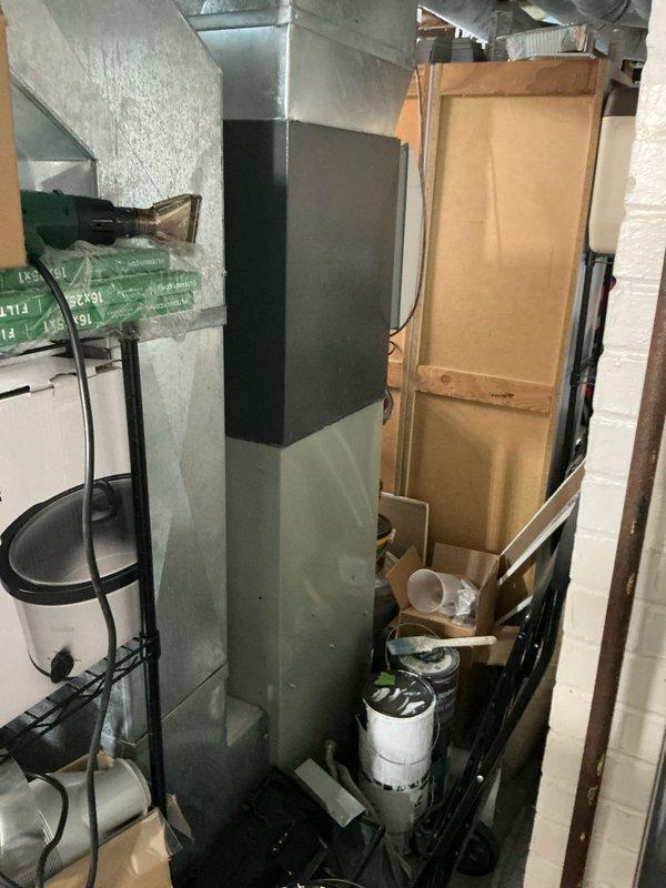 Conducted on-site evaluation of existing forced air cooling system for replacement estimate. Assessed outdoor condensing unit located in side yard and indoor air handler/ductwork system in basement utility area. Documented current equipment configuration, accessibility for installation, and provided homeowner with AC replacement options for the existing forced air system.