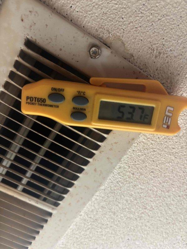 Responded to customer concern regarding decreased air conditioning efficiency following previous service. Performed diagnostic temperature measurements at supply and return locations to assess system performance. Return air temperature measured at 72.1°F at air handler unit, while supply air temperature at register measured 53°F, indicating a temperature differential of approximately 19°F. This delta suggests the system is producing cooling but may be operating below optimal efficiency range for typical residential comfort cooling applications. Additional evaluation of refrigerant charge, airflow restrictions, and system components may be required to restore unit to manufacturer specifications and address customer's efficiency concerns.