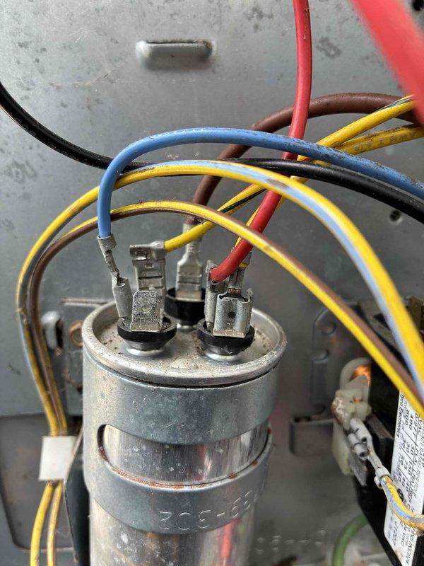 Completed afternoon cooling maintenance on three HVAC units and hot water heater. Performed comprehensive system inspections including electrical component testing, capacitor verification, and temperature measurements across all units. Supply air temperature readings confirmed proper cooling performance at approximately 44°F, indicating adequate refrigerant charge and system operation. All capacitors inspected and found operational with secure wire connections. Systems tested and left in proper working condition.