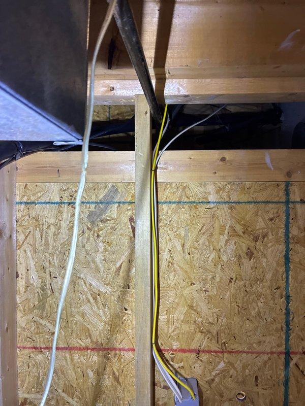 Conducted HVAC system replacement estimate at residential property. Evaluated existing Trane unit model TOH2B0080A91A/NP4 and assessed installation site conditions including structural framing, electrical wiring configuration, and accessibility requirements for new equipment installation. Documented current system specifications and photographed unit identification information along with workspace layout to develop comprehensive replacement options for homeowner consideration.