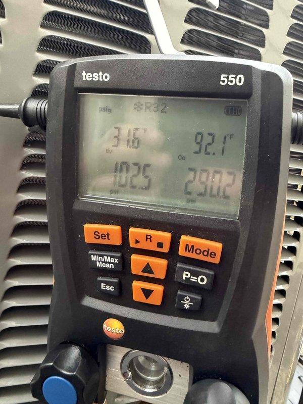 Completed warranty inspection and refrigerant charge on newly installed HVAC system. Verified system pressures using calibrated digital gauges, recording readings of 69 psig on high side and 13.4 inHg on low side, with superheat at 24.6°F and subcooling at 92.1°F. System charged to manufacturer specifications and operating within normal parameters.