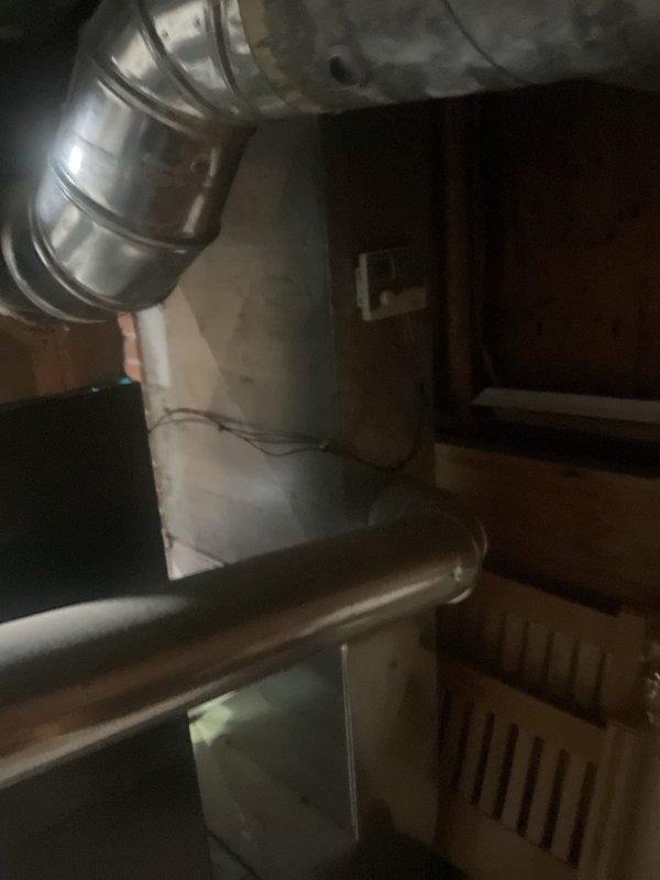 Completed comprehensive cooling maintenance on residential HVAC system located in basement utility area. Performed standard inspection of air handler unit, ductwork connections, and associated components to ensure optimal system performance for the cooling season. All equipment found to be in proper working condition with no immediate service needs identified.