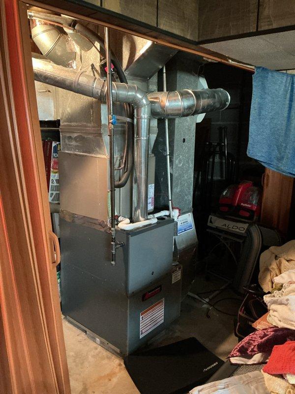 Completed scheduled heating maintenance on residential furnace system as part of ongoing preventative maintenance program. Performed comprehensive inspection of blower motor assembly, gas valve controls, electrical connections, and burner components with all systems found operating within normal parameters. Documented internal components and overall installation condition, confirmed proper airflow through ductwork, and verified safe operation of heating unit.