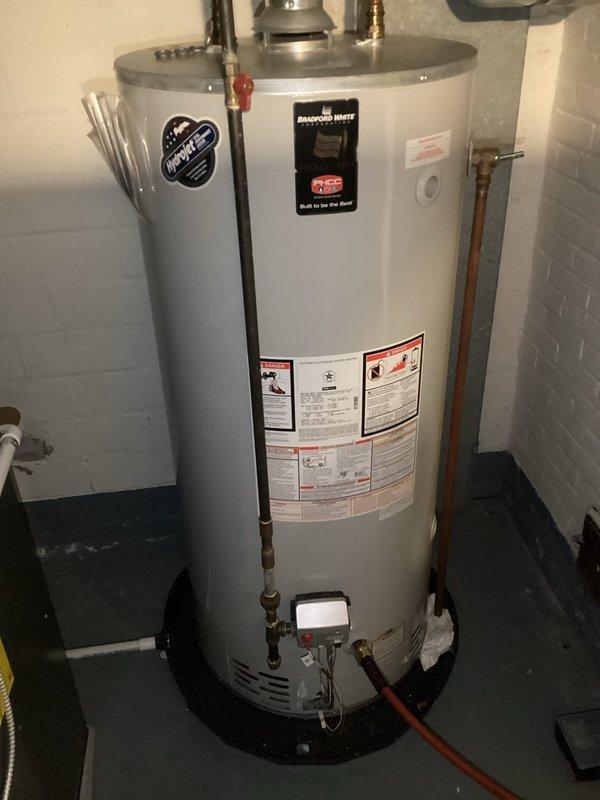 Completed scheduled maintenance on Bradford White tanked water heater, performing a comprehensive flush and fill procedure to remove sediment buildup and ensure optimal performance. All plumbing connections, pressure relief valve, and gas control components were inspected and found to be in proper working condition. Unit was refilled and returned to normal operation as part of ongoing preventive maintenance program.
