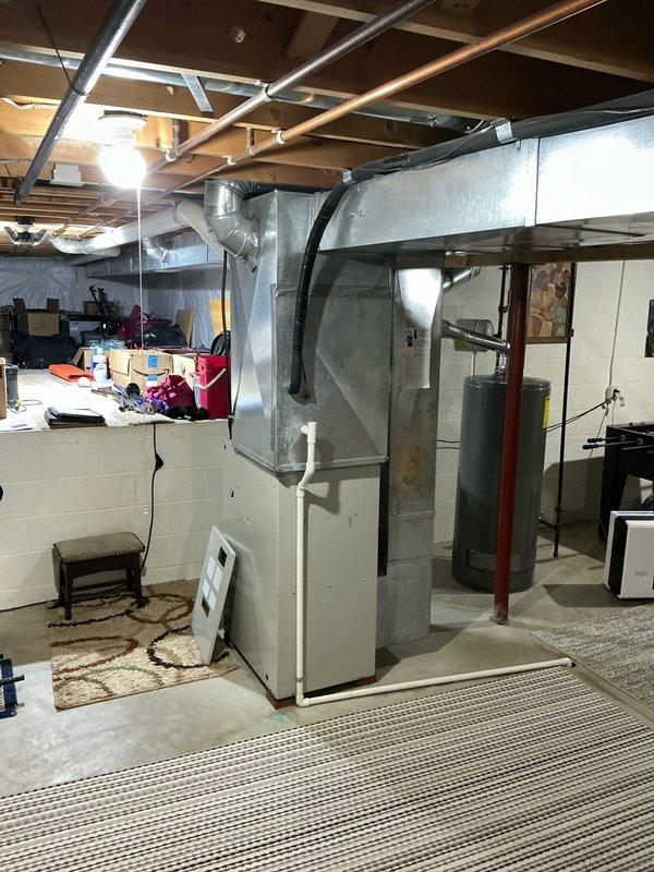 Conducted comprehensive assessment of existing HVAC system in basement mechanical room and presented three full system replacement options featuring Goodman air conditioning and gas furnace combinations. Good tier option included up to 13.4 SEER A/C unit paired with 80% AFUE gas furnace, Better tier featured up to 14 SEER A/C with 96% AFUE furnace, and Best tier offered up to 16 SEER A/C with 96% AFUE furnace. Reviewed Aprilaire media cabinet options with customer to optimize system airflow and efficiency, emphasizing importance of proper return drop sizing and premium filtration for maximum HVAC performance.