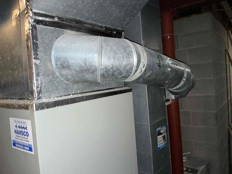 Responded to emergency service call for furnace that had caught fire. Conducted thorough assessment of existing HVAC system and documented fire damage to furnace unit. Evaluated ductwork connections, plenum assembly, and air handler components in basement mechanical room. Provided comprehensive replacement options and created detailed layout diagrams with measurements for new equipment installation, including specifications for proper ductwork configuration and system sizing requirements.