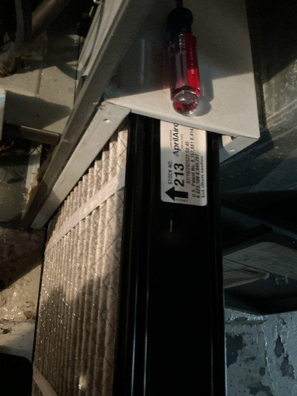 Completed scheduled cooling maintenance service on two HVAC systems. Performed comprehensive inspection of both units, including air filter replacement on system with pleated media filter in attic location. Verified proper operation of Aprilaire humidifier control displaying normal humidity levels at 99% on digital readout. Inspected all electrical connections, wiring terminals, and control components for secure mounting and proper function. Both systems operating within normal parameters with no deficiencies noted at time of service.