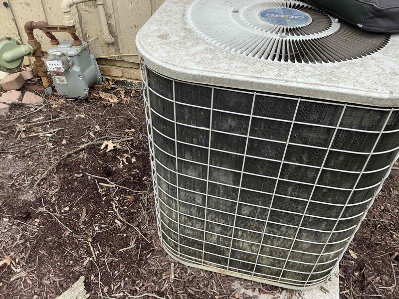 Performed comprehensive assessment of residential HVAC system following recent storm damage. Documented extensive rust and corrosion on interior galvanized ductwork and evaluated outdoor condenser unit showing significant weathering, dirt accumulation, and debris intrusion. System exhibits advanced deterioration requiring full equipment replacement. Provided detailed photographic documentation and replacement recommendations to address compromised components and restore proper cooling functionality.