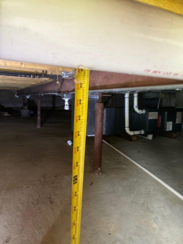 Conducted on-site evaluation of existing basement HVAC system and provided furnace replacement options to customer. Documented current equipment configuration, measured available clearances for new installation, and assessed existing ductwork and utility connections to determine compatibility with replacement unit specifications.