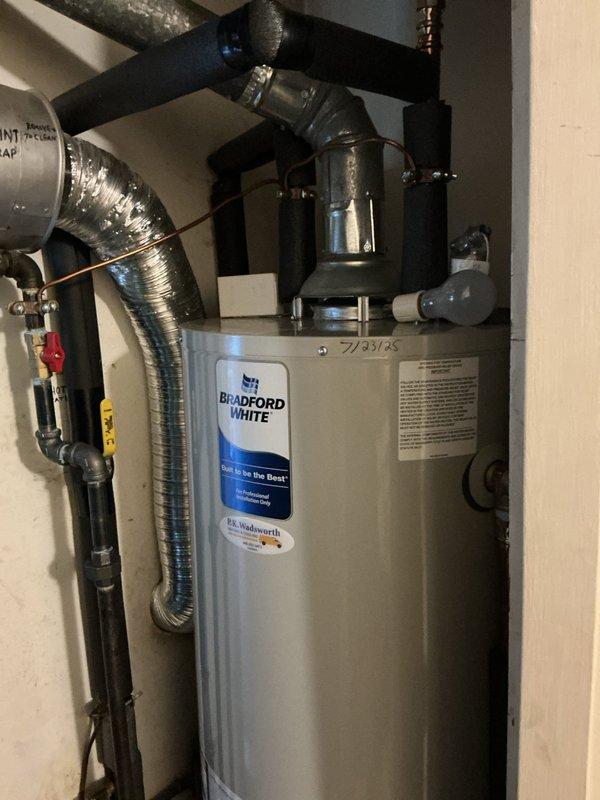 Completed scheduled HVAC cooling maintenance on residential air conditioning system. Performed comprehensive inspection of outdoor condenser unit, including examination of compressor operation, refrigerant lines, electrical connections, and condenser coil condition. Verified proper airflow through unit louvers and confirmed fan motor operation. Documented equipment condition with photographic evidence showing unit installed on concrete pad with appropriate clearances. Also inspected water heater installation and associated plumbing connections during service visit to ensure overall system functionality.