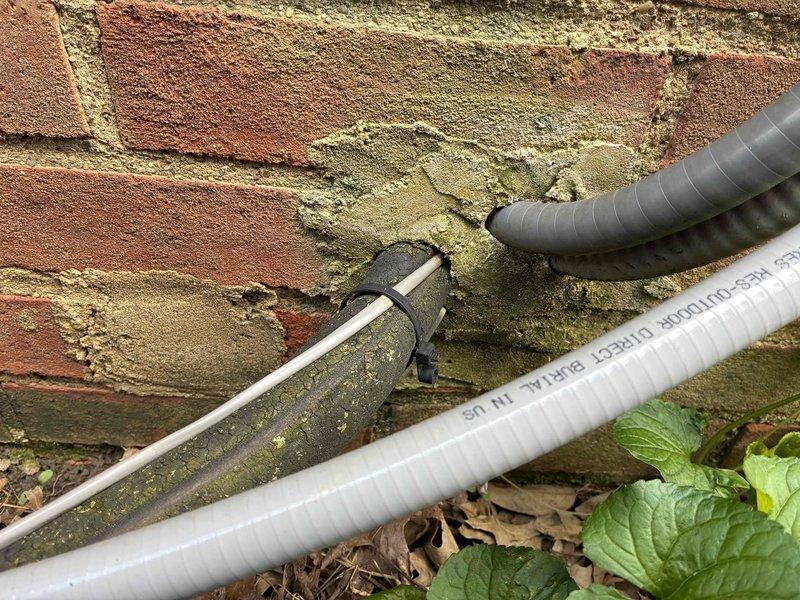 Performed system start-up on newly installed air conditioning unit. Verified proper operation of condensate drainage system with PVC discharge lines and electrical conduit installation along exterior foundation. All components tested and confirmed operational with system running within manufacturer specifications.