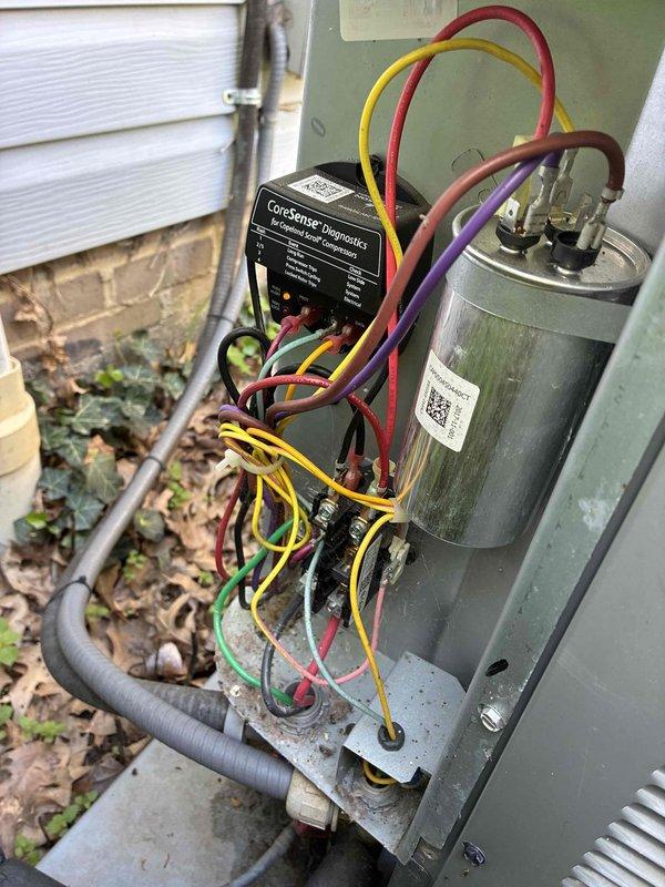 Completed monthly preventive maintenance on outdoor cooling unit. Inspected and verified proper operation of Copeland Protronics control module, capacitor, and all electrical connections; performed voltage and amperage readings using digital multimeter to confirm system operating within manufacturer specifications. All components found in good working condition with no deficiencies noted.