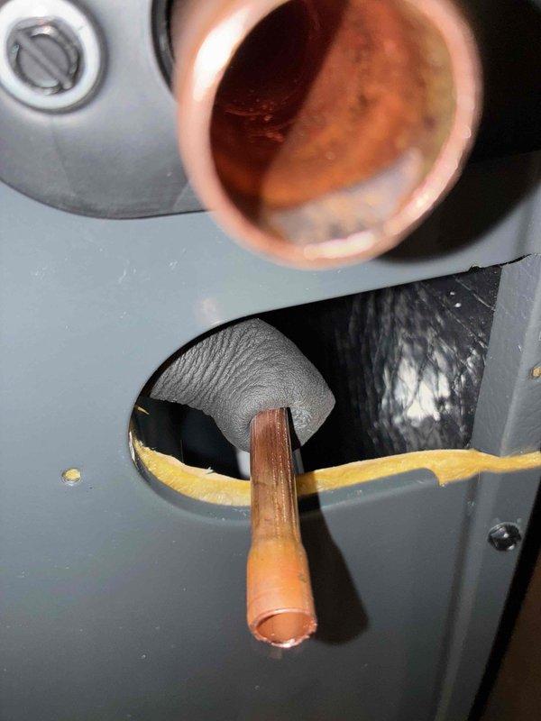 Completed warranty coil replacement on HVAC system. Removed and replaced defective evaporator coil, reconnected refrigerant lines through cabinet penetrations, and sealed all openings with appropriate insulation material. System tested and confirmed operational upon completion.