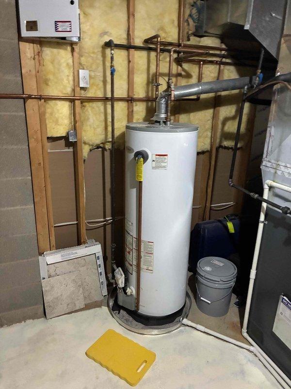 Responded to service call for water heater with pilot light outage. Upon arrival, inspected tanked water heater unit in basement mechanical room and confirmed pilot was not lit. Assessed gas supply, thermocouple condition, and burner assembly for proper operation. Successfully relit pilot light and verified ignition system functionality. Tested water heater operation through complete heating cycle to ensure proper burner ignition and temperature control. Unit restored to normal operating condition.