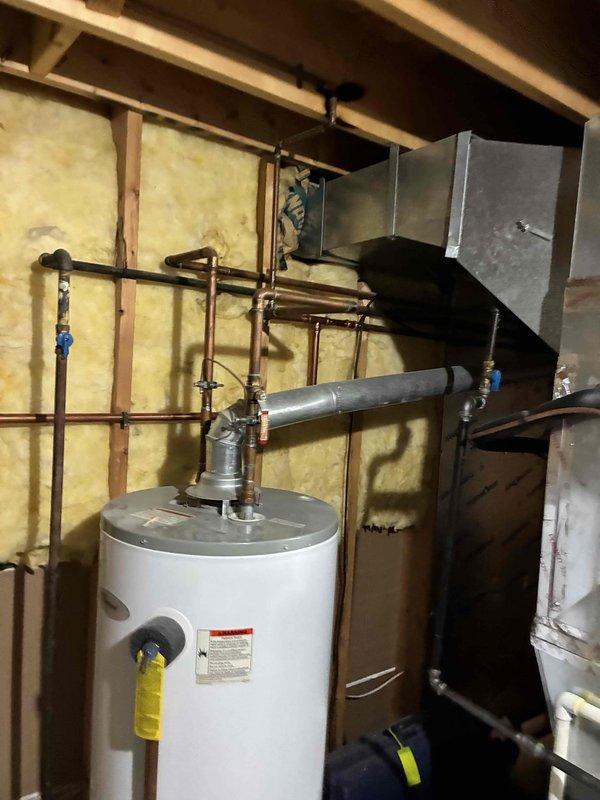 Responded to service call for water heater with pilot light outage. Upon arrival, inspected tanked water heater unit in basement mechanical room and confirmed pilot was not lit. Assessed gas supply, thermocouple condition, and burner assembly for proper operation. Successfully relit pilot light and verified ignition system functionality. Tested water heater operation through complete heating cycle to ensure proper burner ignition and temperature control. Unit restored to normal operating condition.