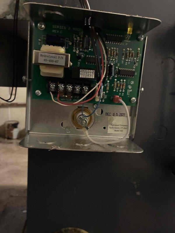 Completed annual maintenance visit on steam boiler system per service plan agreement. Performed comprehensive inspection of boiler control board and electrical components. Tested and recorded amperage draw using clamp meter, confirming proper electrical operation at 0.44 amps. Inspected primary control circuit board assembly, verified all connections secure, and confirmed proper functionality of safety controls and relays. Checked wiring terminals for tightness and signs of heat damage. All system components operating within normal parameters with no issues found requiring immediate attention.