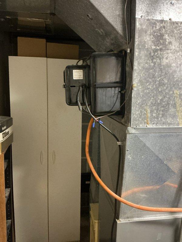 Completed first-year heating maintenance inspection on customer's HVAC system as part of scheduled preventative maintenance program. Performed visual inspection of heating unit, ductwork connections, and mechanical components in utility area, documenting equipment condition with photographs showing normal operational wear on burner assembly and exhaust ports. All components found to be functioning within acceptable parameters with no immediate service needs identified.