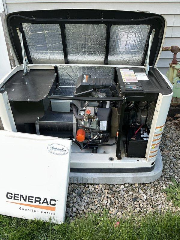 Responded to service call for Generac Guardian Series standby generator displaying red fault light and failure to operate following power outage and surge event. Upon arrival, performed visual inspection of unit and internal components. Identified severe corrosion on battery terminals and cable connections, which prevented proper electrical contact and system startup. Cleaned battery terminals and cable ends, removing corrosion buildup. Tested battery voltage and charging system operation. Verified all mechanical components, engine systems, and control board for surge damage. Reset fault codes and conducted operational test to confirm generator functionality restored. Unit returned to normal standby mode with no fault indicators present.