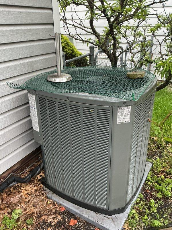 Completed scheduled contract maintenance on residential air conditioning system. Performed comprehensive inspection of outdoor condensing unit, verified proper operation of all components, and documented equipment condition with photographic records showing unit in maintained operational status on concrete pad with adequate clearance and ventilation.