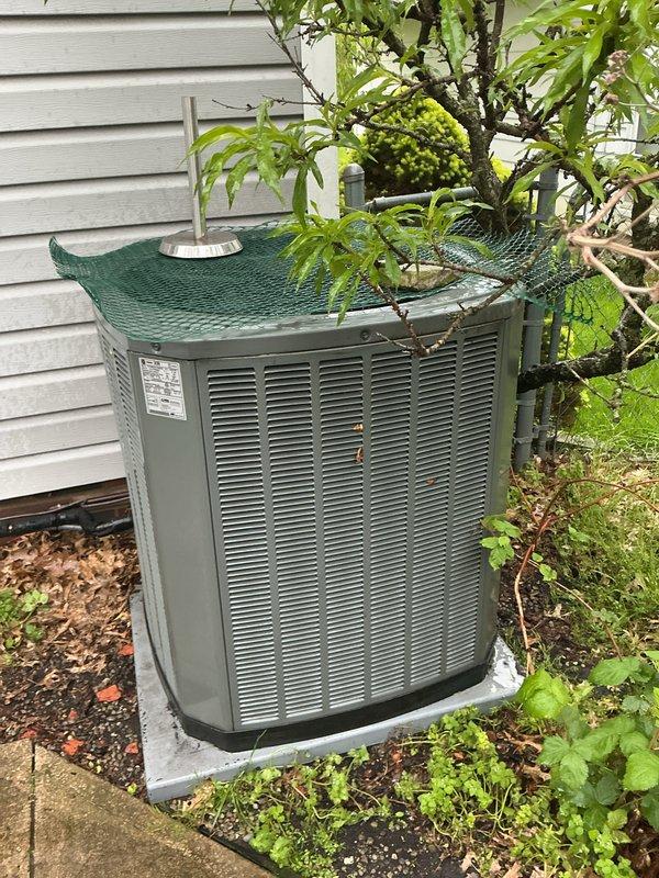 Completed scheduled contract maintenance on residential air conditioning system. Performed comprehensive inspection of outdoor condensing unit, verified proper operation of all components, and documented equipment condition with photographic records showing unit in maintained operational status on concrete pad with adequate clearance and ventilation.