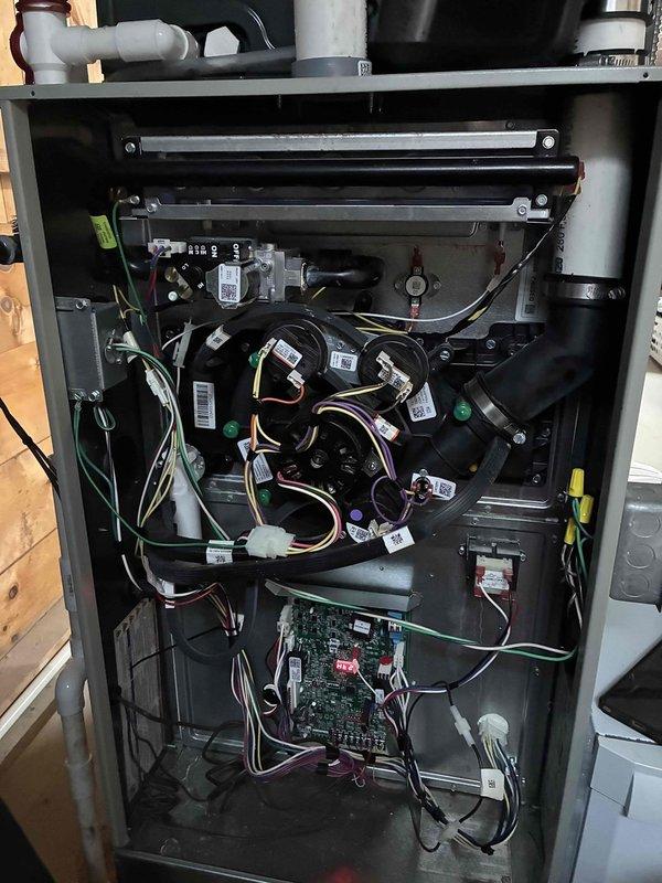 Completed comprehensive heating maintenance on two HVAC systems, performing detailed inspections of all internal components including blower motor assemblies, electrical connections, control boards, and venting systems. All wire bundles, circuit boards, and mechanical components were examined for proper operation, with air handler units and filtration systems verified to be functioning within normal parameters.