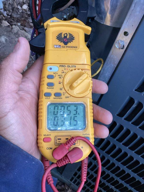 Completed scheduled cooling maintenance on outdoor AC condenser unit. Performed comprehensive system inspection including electrical diagnostics using digital multimeter to verify proper voltage and amperage readings. Inspected condenser coil fins for debris accumulation and airflow restriction. Unit operational and maintaining proper cooling function at time of service completion.