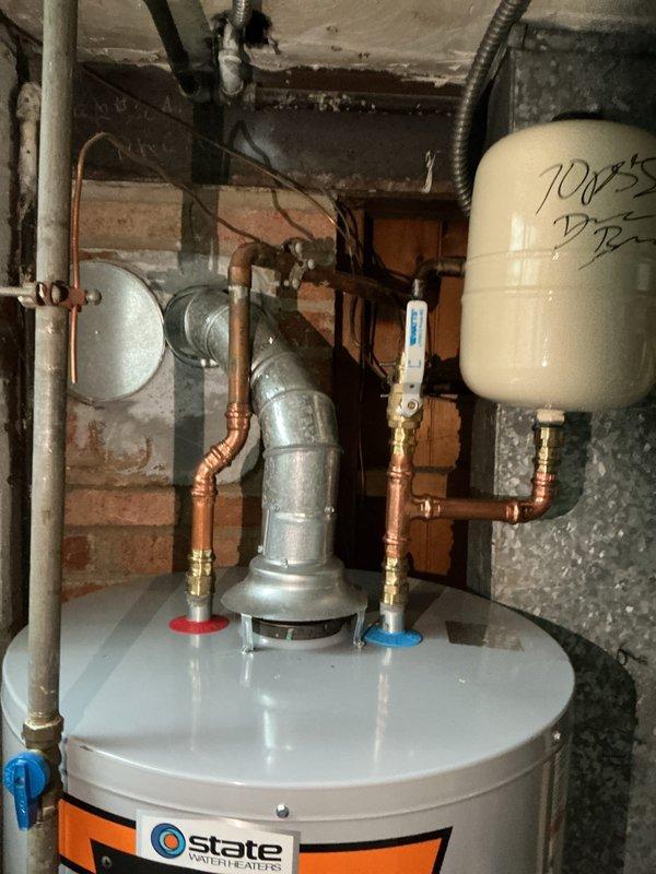Performed routine maintenance flush on residential tanked water heater to remove sediment buildup and ensure optimal performance. Unit was drained completely, flushed thoroughly, and refilled with proper procedures followed for all shut-off valves and supply connections.