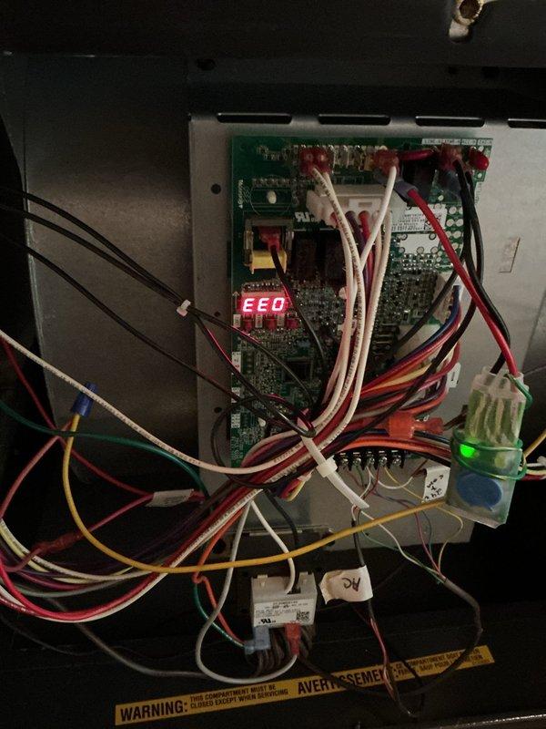 Responded to no heat call on Goodman furnace unit. Upon arrival, found control board displaying "EEO" error code on LED readout. Diagnosed control board fault preventing furnace operation. Inspected electrical panel connections, wiring harnesses, and system components to confirm board failure as root cause of heating system shutdown.