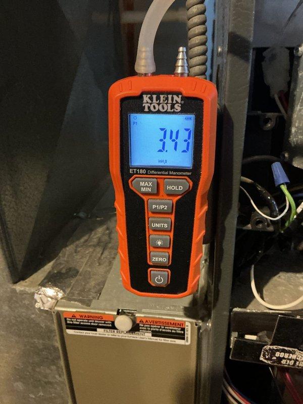 Responded to no heat call on residential furnace system. Upon inspection, accessed unit interior and performed diagnostic testing of heating components. Measured gas pressure at 343 inches water column using differential manometer, indicating significant overpressure condition at gas valve. Normal operating pressure should be between 3.5-4.0 inches water column for natural gas applications. Identified gas valve pressure regulator issue causing dangerous overpressure that prevented burner ignition as a safety measure. Adjusted gas valve regulator to manufacturer specifications and verified proper pressure readings. Confirmed all electrical connections secure, blower motor operational, and heat exchanger intact with no visible damage. Cycled system through multiple heating cycles to verify proper ignition sequence, flame characteristics, and temperature rise. Unit restored to normal heating operation with safe gas pressure levels maintained throughout testing.