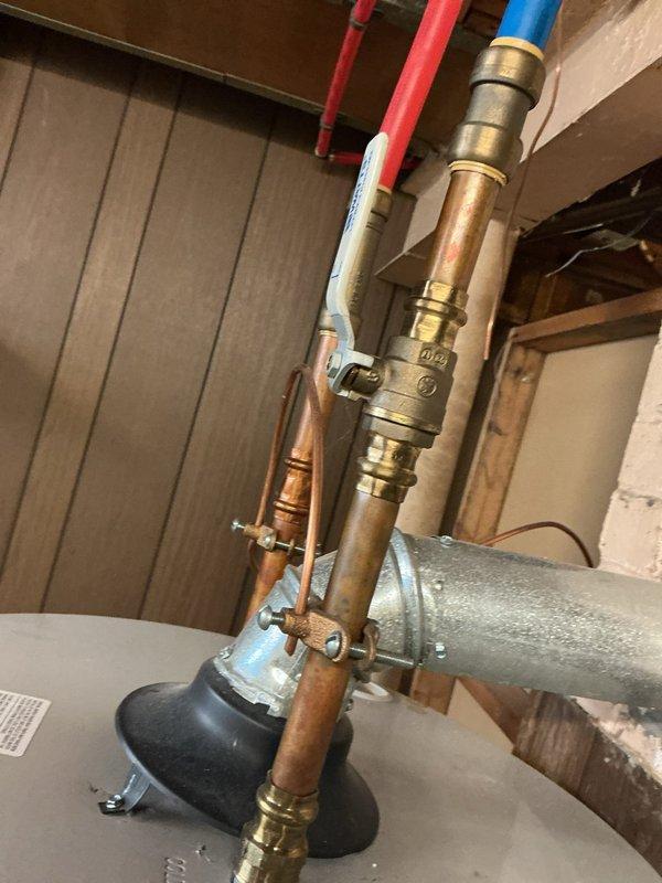 Completed routine cooling system maintenance on residential HVAC unit. Performed thorough inspection of evaporator coil assembly, noting accumulated dust and debris between aluminum fins and refrigerant lines. Examined refrigerant piping connections, brass valve assemblies, and associated plumbing components in mechanical room to ensure proper operation and identify any potential leaks or wear. All system components found to be functioning within normal parameters.