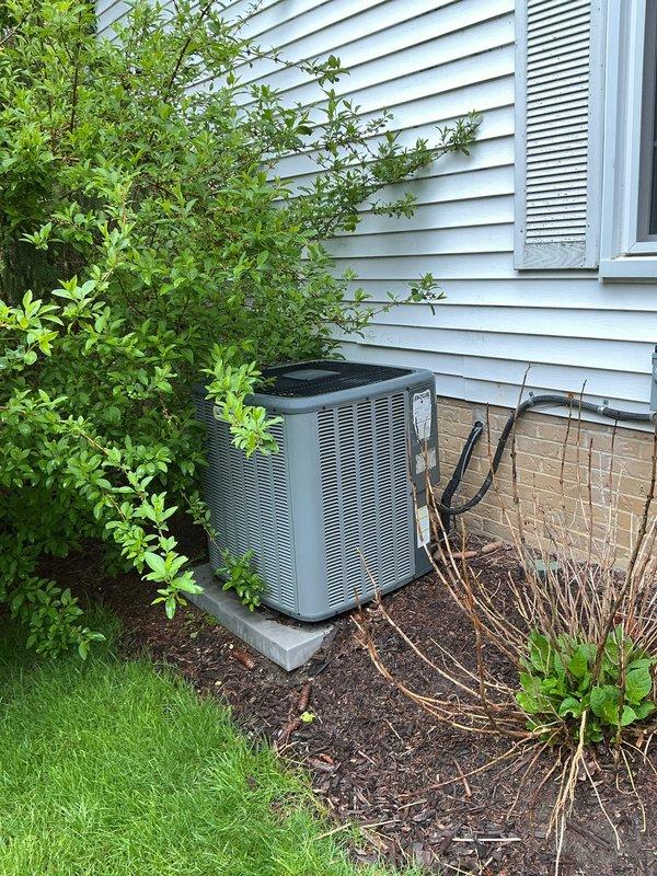 # HVAC Cooling Maintenance Completed

Performed comprehensive seasonal cooling maintenance on residential split system air conditioning unit. Inspected indoor air handler located in basement utility area, accessing control board and internal components through service panel. Verified proper operation of electronic controls and monitoring equipment. Evaluated outdoor condensing unit positioned on concrete pad with proper clearance from landscaping. Conducted standard preventive maintenance procedures including visual inspection of both indoor and outdoor components, verification of electrical connections, and assessment of overall system condition. System found to be operating within normal parameters. All maintenance tasks completed as part of ongoing recurring service agreement.